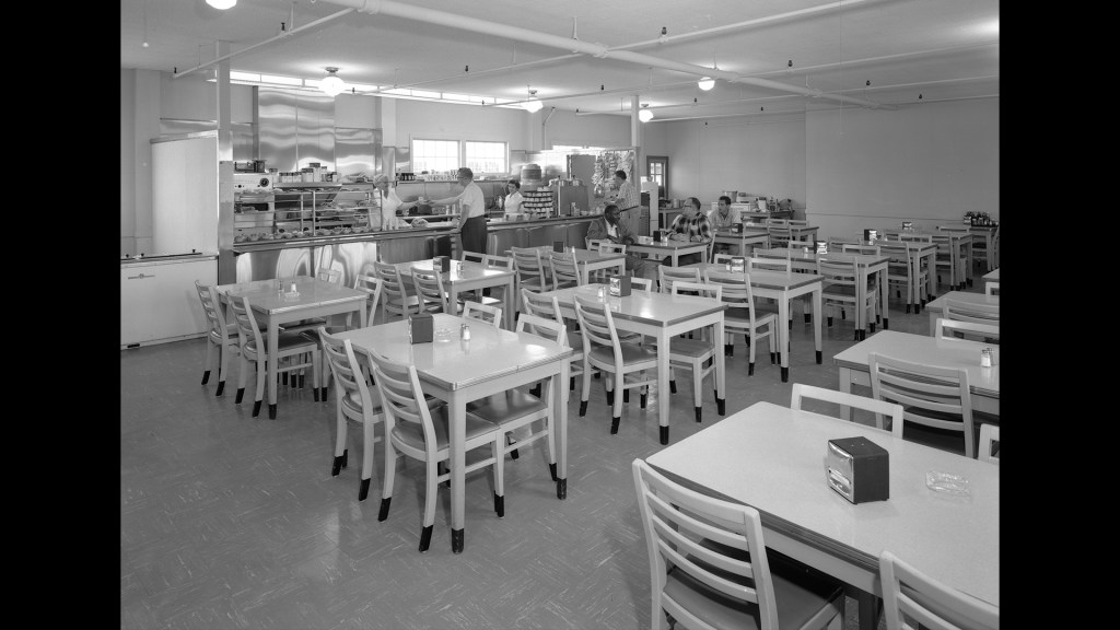 Tables and counter inside Cafeteria Building.
