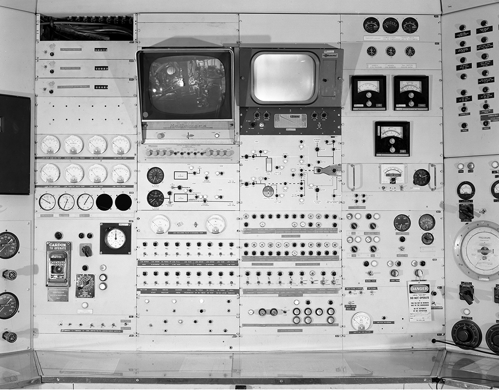 Control panels in control room.