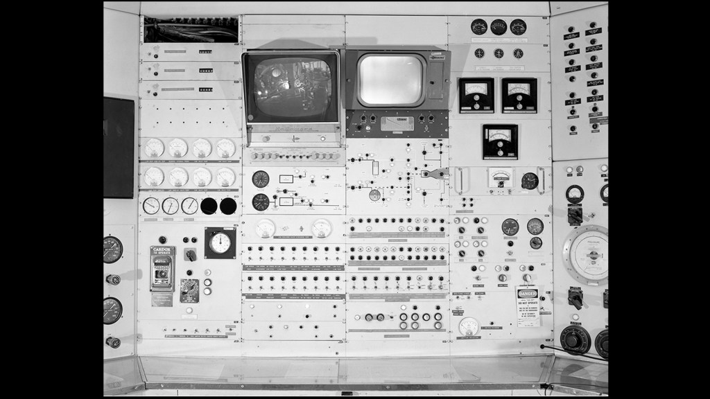 Control panels in control room.
