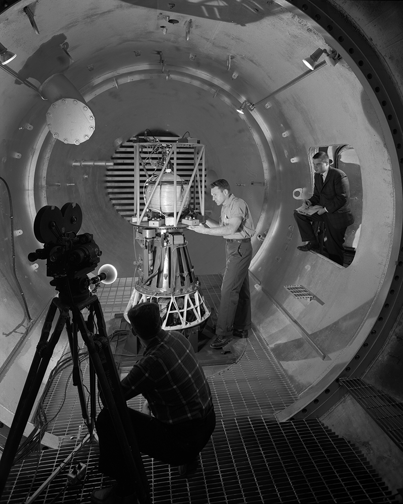 Man working on equipment.