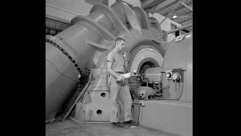 Technician working with exhauster