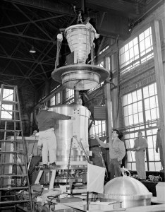 Mechanics in warehouse assemble nuclear engine
