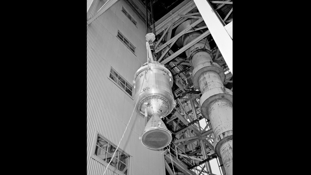 View up at Kiwi B engine as it is lifted into test stand