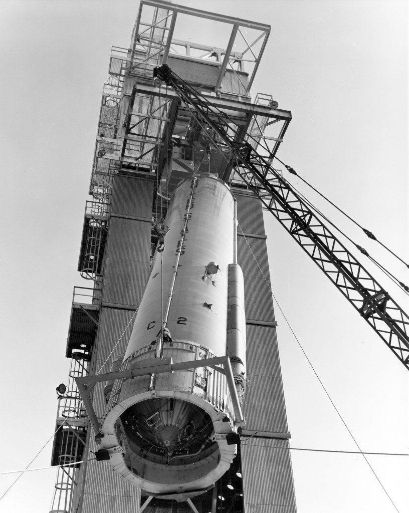 View up as crane lifts missile into E Stand