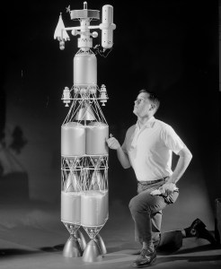 Researcher examines nuclear rocket model.