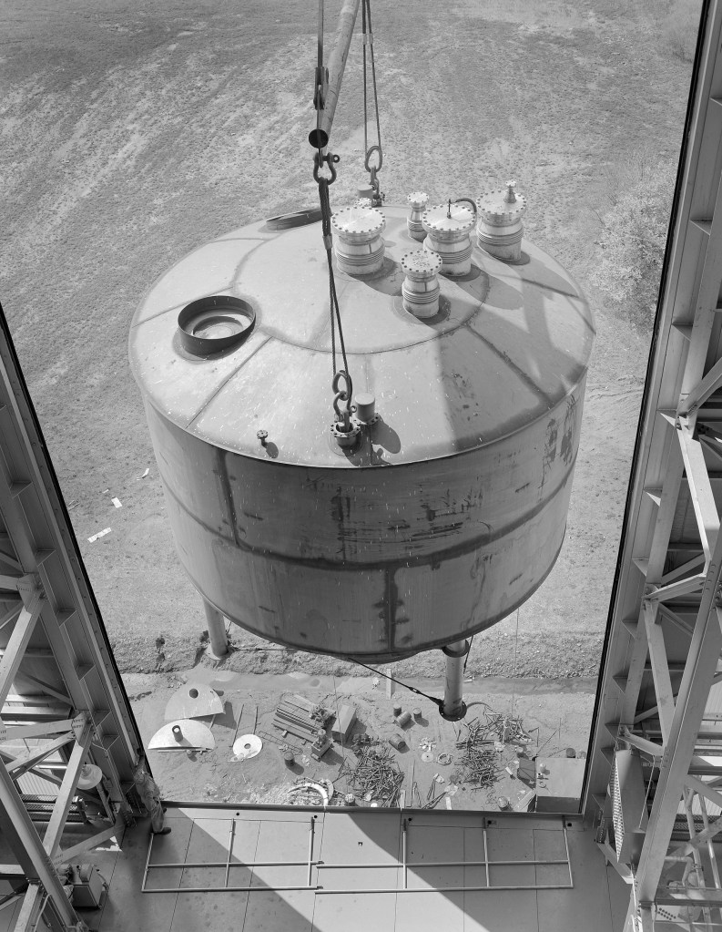 View from above as crane lifts test article into B-3