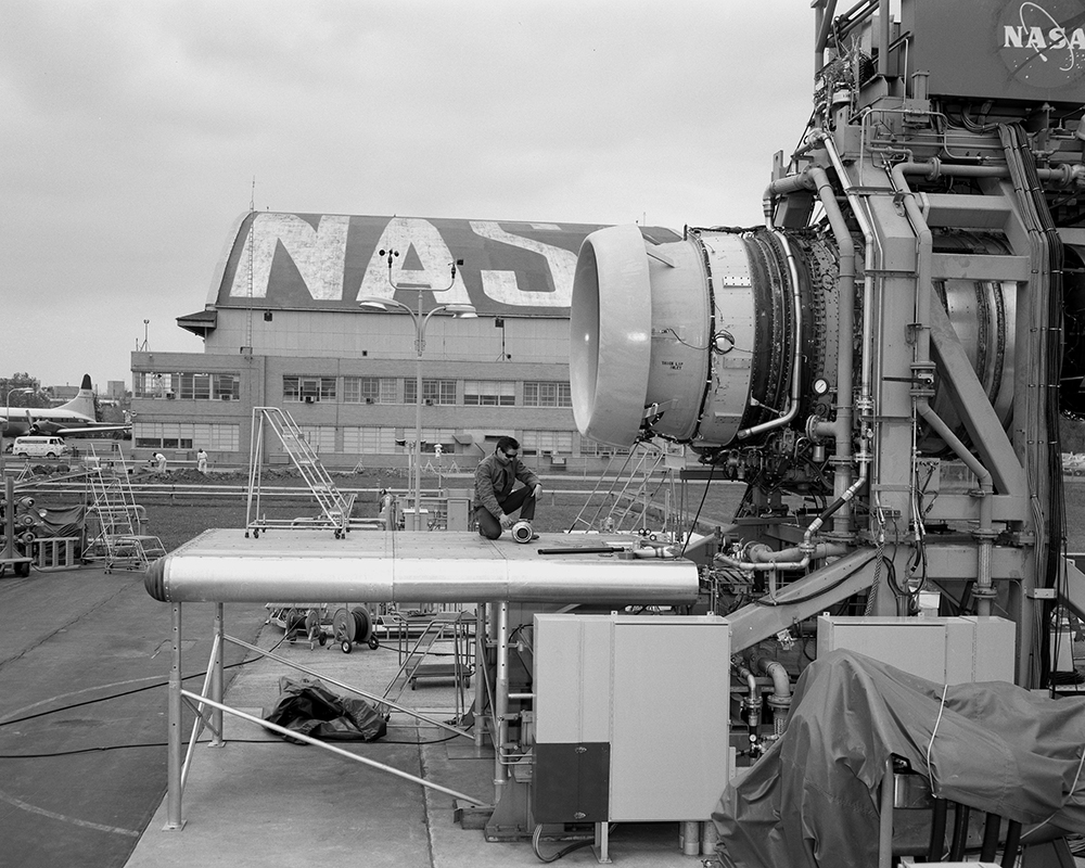 Test equipment with hangar in background.