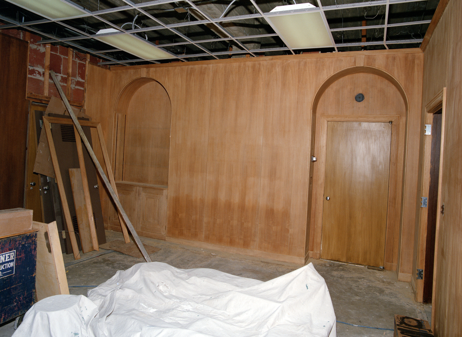 Paneled room under construction.