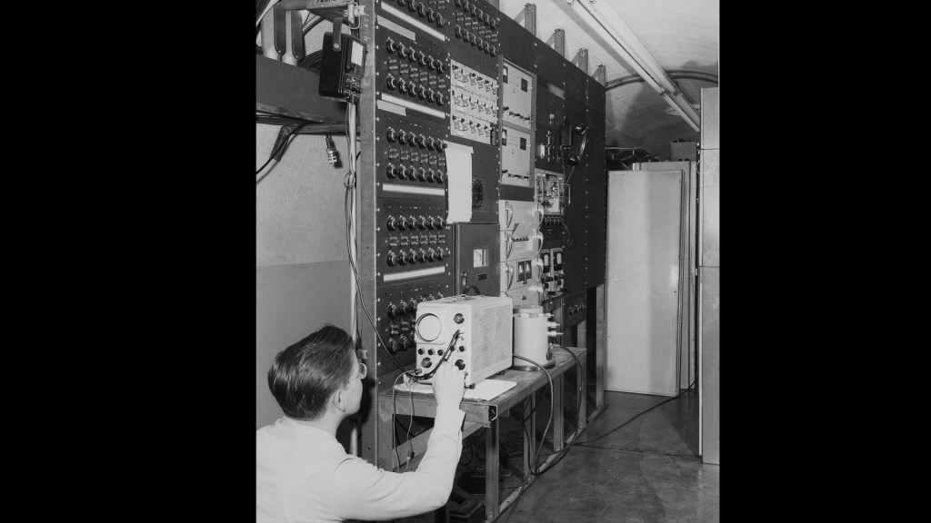 Technician in control room.