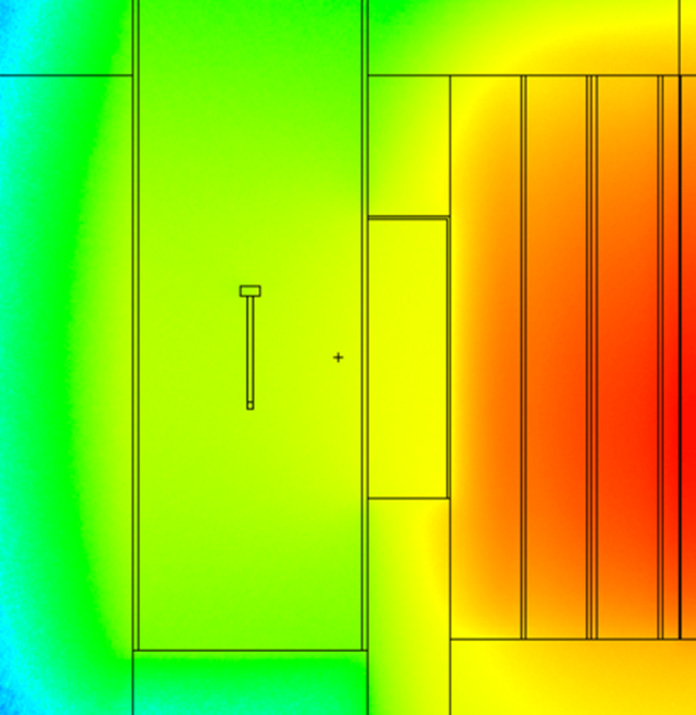Color map of a reactor model showing varying neutron flux, with red for high flux and blue for low, across structural components.