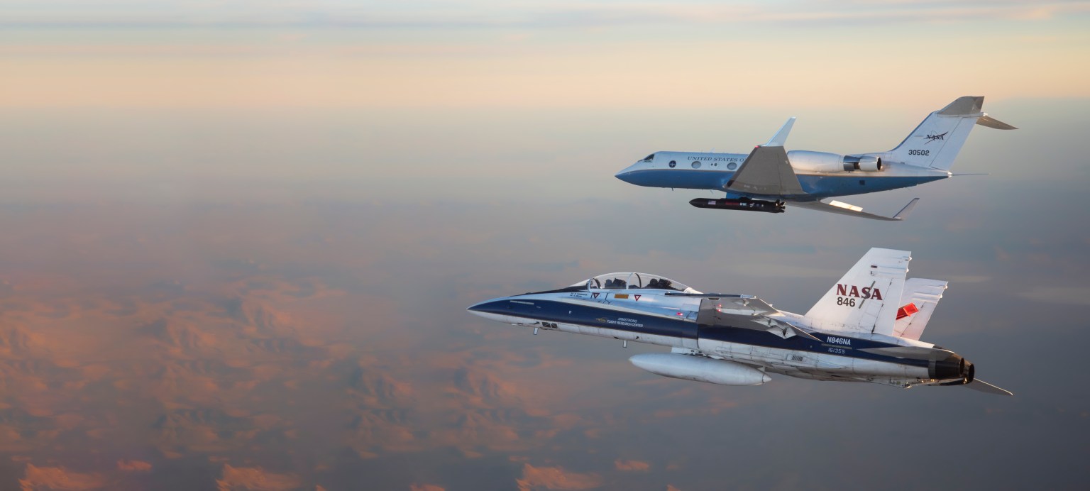 Two jet airplanes in flight.