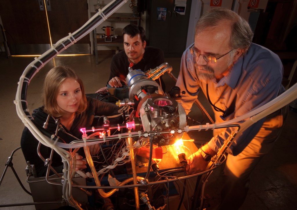 Stefanie Milam, Michel Nueva and Scott Sandford, in the Ames Astrochemistry Lab, N-245 for feature article on their uracil research. NASA Scientists studying the origin of life have reproduced uracil, a key component of our hereditary material in the laboratory.