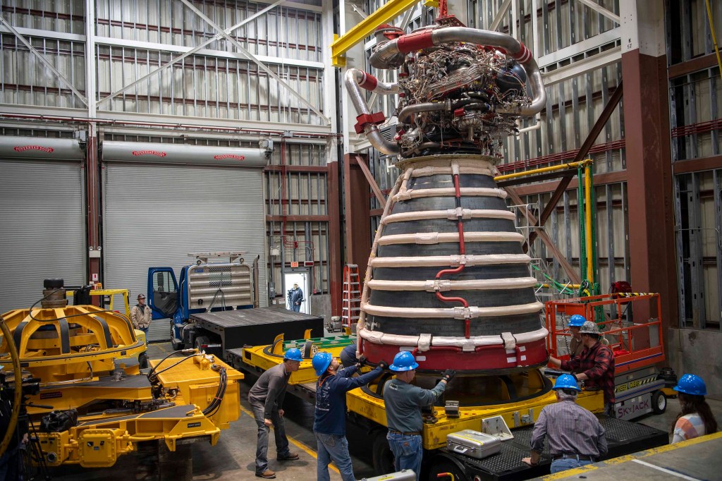 Teams at NASA’s Stennis Space Center deliver, lift, and install the first new production RS-25 engine on the Fred Haise Test Stand on Feb. 18.