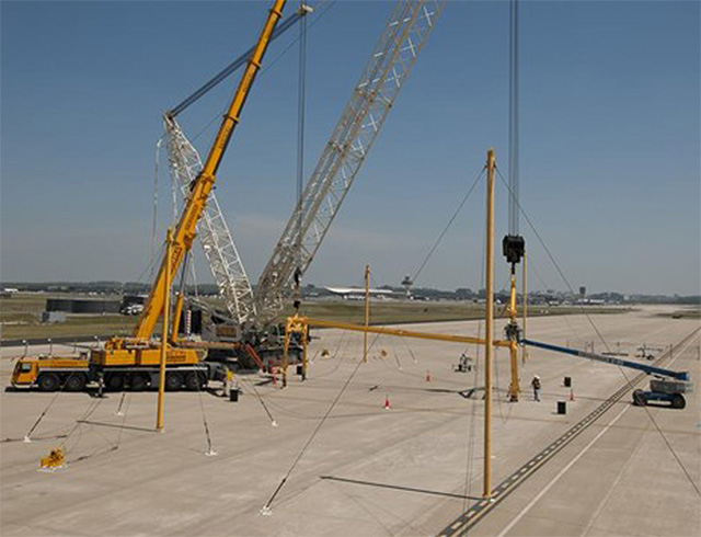 A crane lifting items
