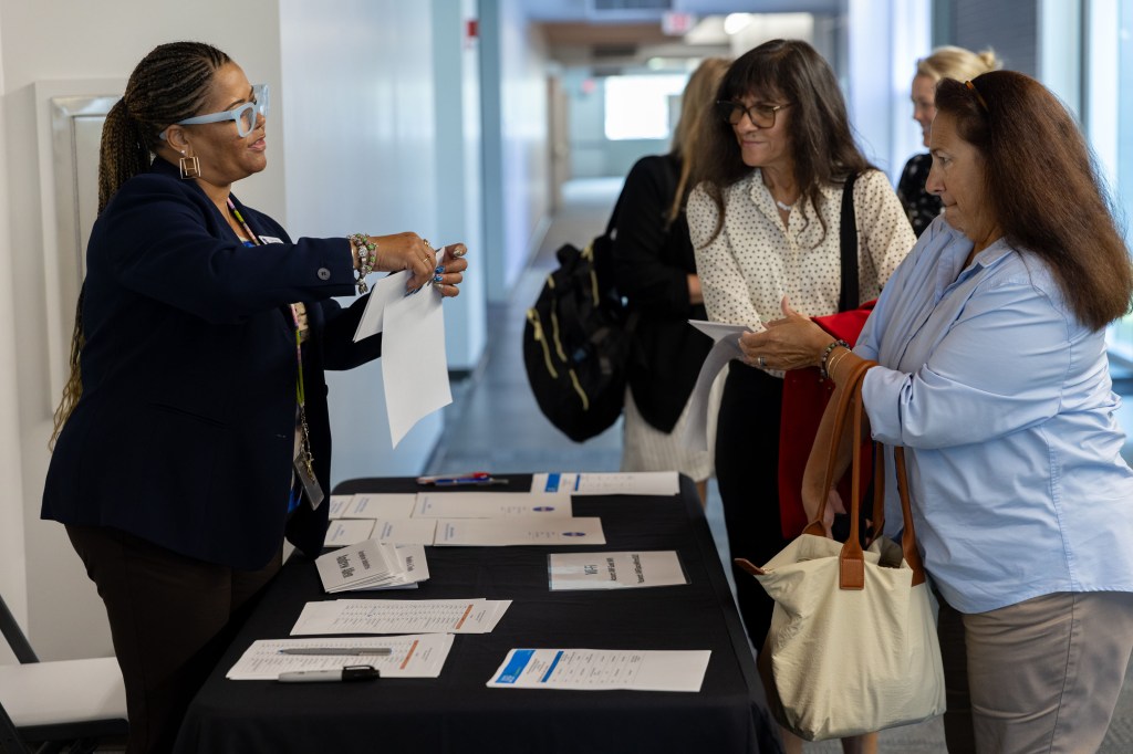 Picture of a group registering for the OSBP LIFT engagement event