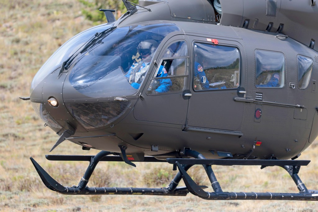 NASA astronaut Mark Vande Hei lands a helicopter as part of flight and landing training at the High Altitude Army National Guard Aviation Training Site Aug. 28.