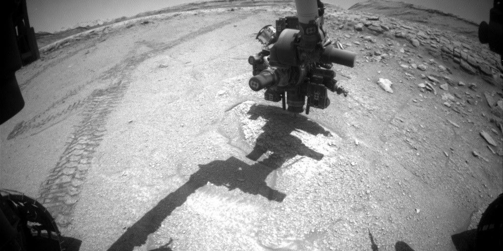 NASA’s Mars rover Curiosity acquired this image at the start of the drilling activity at the “Valle de la Luna” site, “caught in the act” as this image was taken on Oct. 19, 2025. Curiosity used its Front Hazard Avoidance Camera (Front Hazcam) on Sol 4693, or Martian day 4,693 of the Mars Science Laboratory mission, at 01:54:37 UTC.