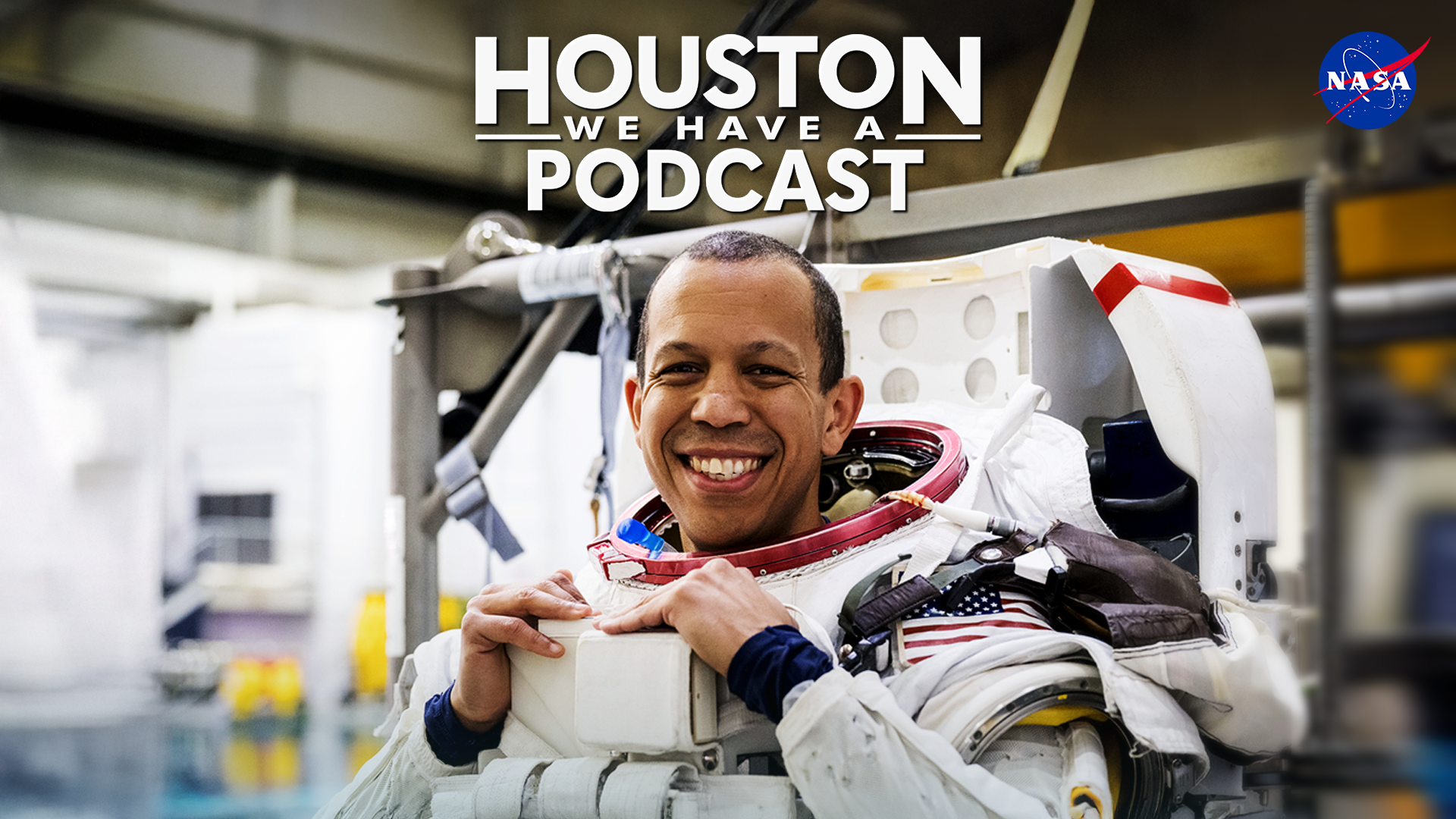 HWHAP Ep. 403. Astronaut Chris Williams smiles from the upper torso of the EMU spacesuit.