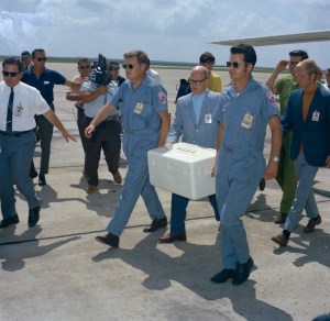 Arrival of Apollo 11 Lunar Samples at EAFB by C-141 Starlifter and at the Bldg. 37 Lunar Receiving Laboratory (LRL). 1. Aircraft - C-141 (Starlifter) EAFB, HOUSTON, TX