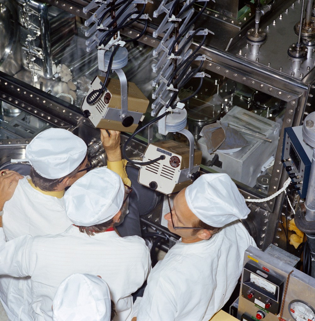 Documentary view of the opening of the Lunar sample return cases (SRC's) in the Lunar Receiving Lab (LRL), Bldg 37.