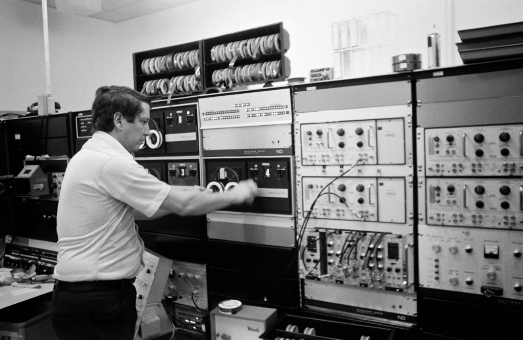 Dr. Robert S. Clark seen in his radiation laboratory in the LRL. JSC, HOUSTON, TX