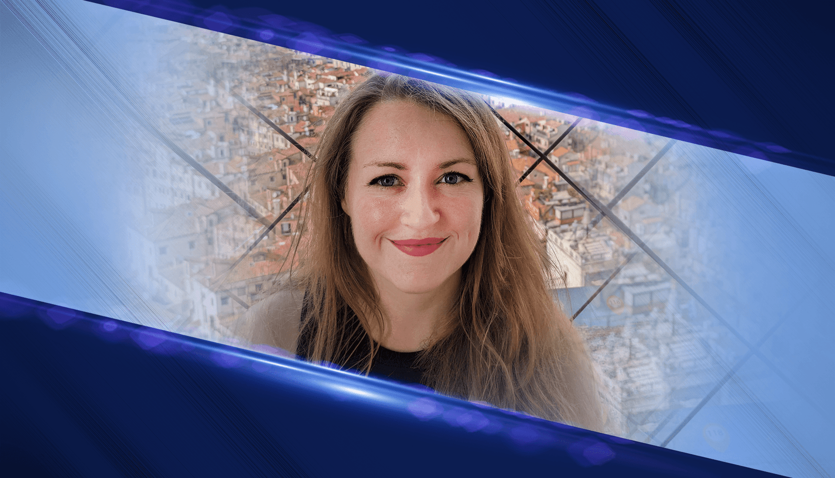 Navigation and Mission Design engineer Lauren Konitzer smiles in front of a panoramic view overlooking Venice, Italy. Historic terracotta-roofed buildings, a cloudy blue sky, and the Adriatic Sea are visible behind a latticed fence. Navigation and Mission Design engineer Lauren Konitzer.