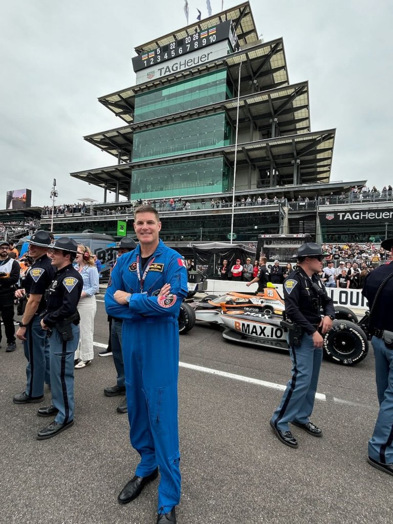 NASA Artemis II crew member Jeremy Hansen is seen at the 2026 Indianapolis 500 Race Weekend as an honored guest of Indianapolis Motor Speedway. Hansen, a Canadian Space Agency astronaut, served as mission specialist among the four crew members aboard NASA’s historic Artemis II lunar flyby during April 2026. The 10-day mission captivated the world, marking the first time in 54 years that humans have traveled within the vicinity of the moon. Indianapolis Motor Speedway will host the 110th Indianapolis 500 presented by Gainbridge on Sunday, May 24, 2026