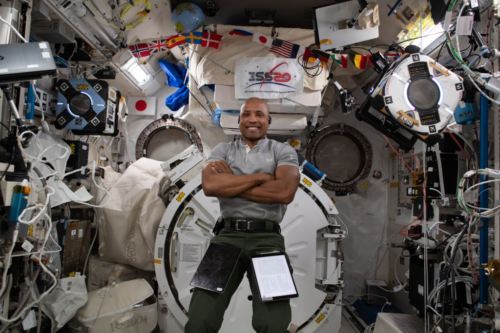 NASA astronaut and Expedition 64 Flight Engineer Victor Glover poses for a portrait inside the International Space Station's Kibo laboratory module.