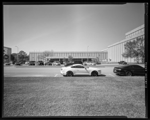 HAER-TX-109-N-04, High Bay West view showing East facing side of Building 9 South; Noth facing side portion of Building 10 and South facing side of Building 9 Northeast