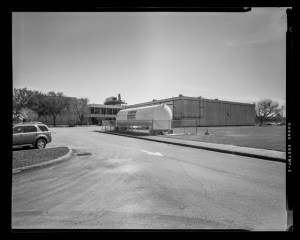 HAER-TX-109-N-07, Northwest facing corner of Tank Farm; Northwest corner of High Bay; West facing side of Admin side; West facing view of Building 31 North in the background