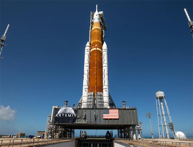 In this view looking up from the flame trench at Launch Pad 39B NASA's Space Launch System rocket and Orion spacecraft are seen atop the mobile launcher.