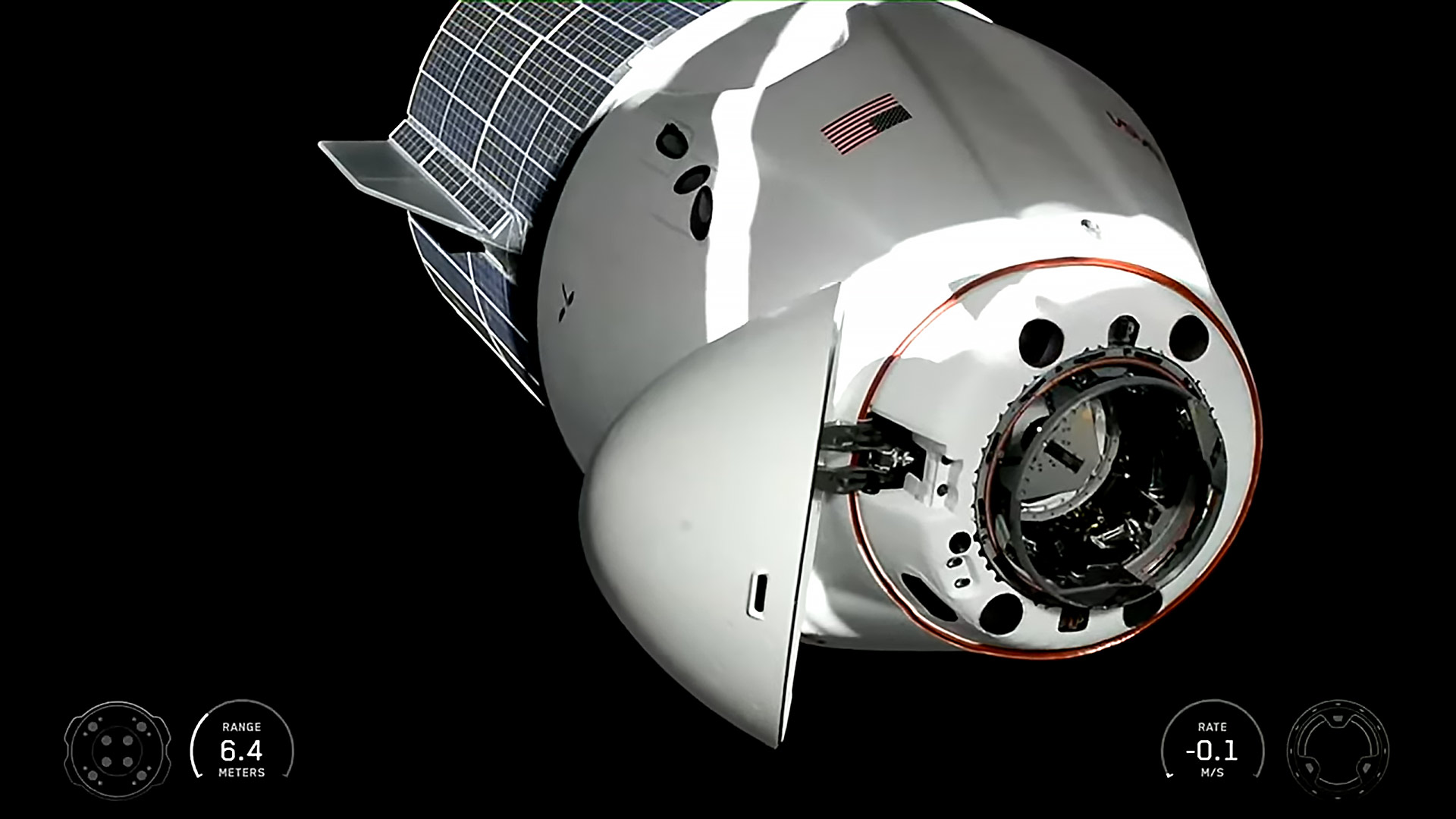The SpaceX Dragon carrying for Crew-12 members nears the International Space Station for a docking to the Harmony module's space-facing port.