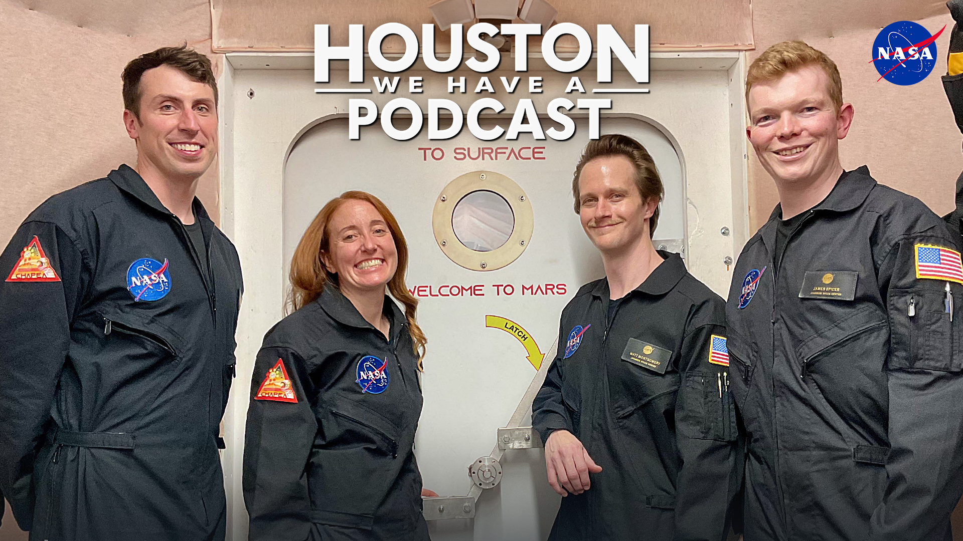 HWHAP Ep. 411. The four crew members of CHAPEA Mission 2 pose in front of the airlock to the simulated Martian surface.