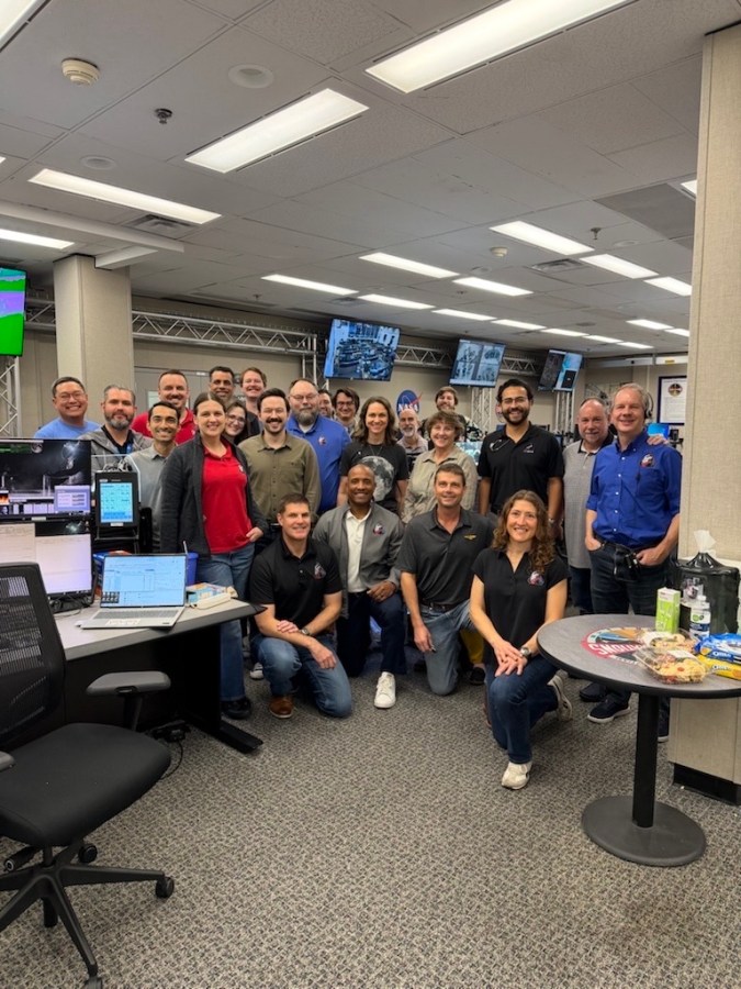 The Artemis II crew, pictured with their training team, completes their final simulation ahead of quarantine.