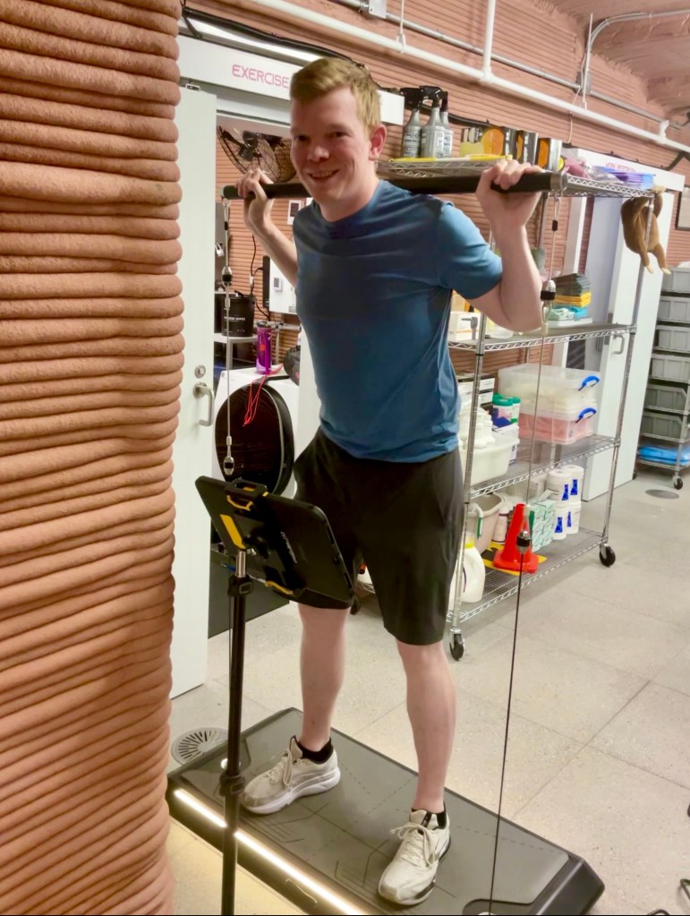 Crew Health and Performance Exploration Analog (CHAPEA) Mission 2 flight engineer, James Spicer, exercising in the habitat.