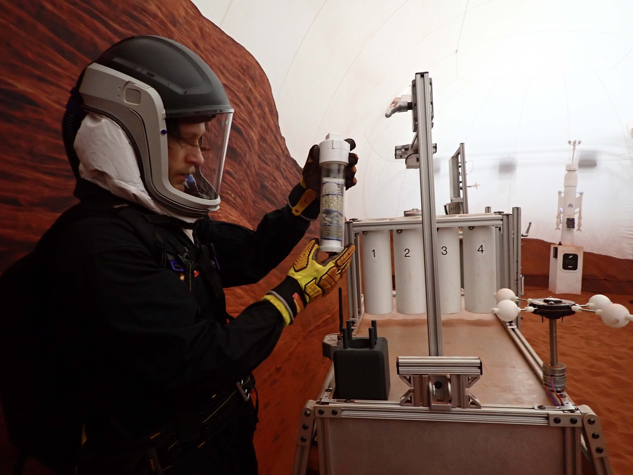 Matthew Montgomery, Crew Health and Performance Exploration Analog (CHAPEA) Mission 2 science officer, participates in an extravehicular geological activity.