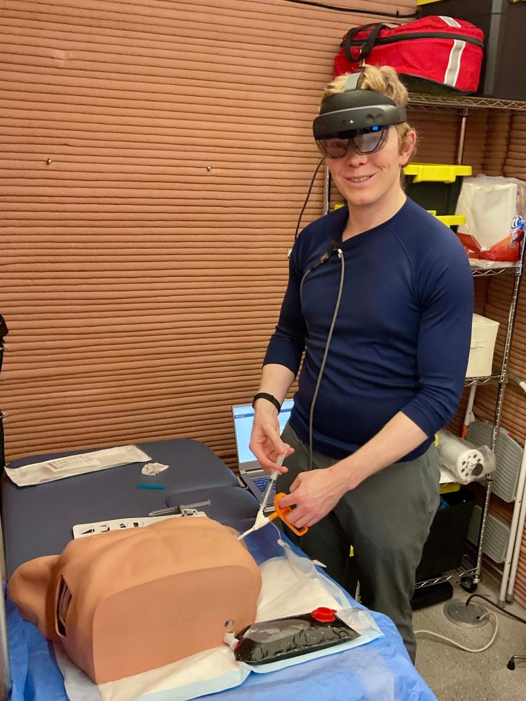 James Spicer, Crew Health and Performance Exploration Analog (CHAPEA) Mission 2 flight engineer, performing a demonstration of Artificial Intelligence-enabled medical training.