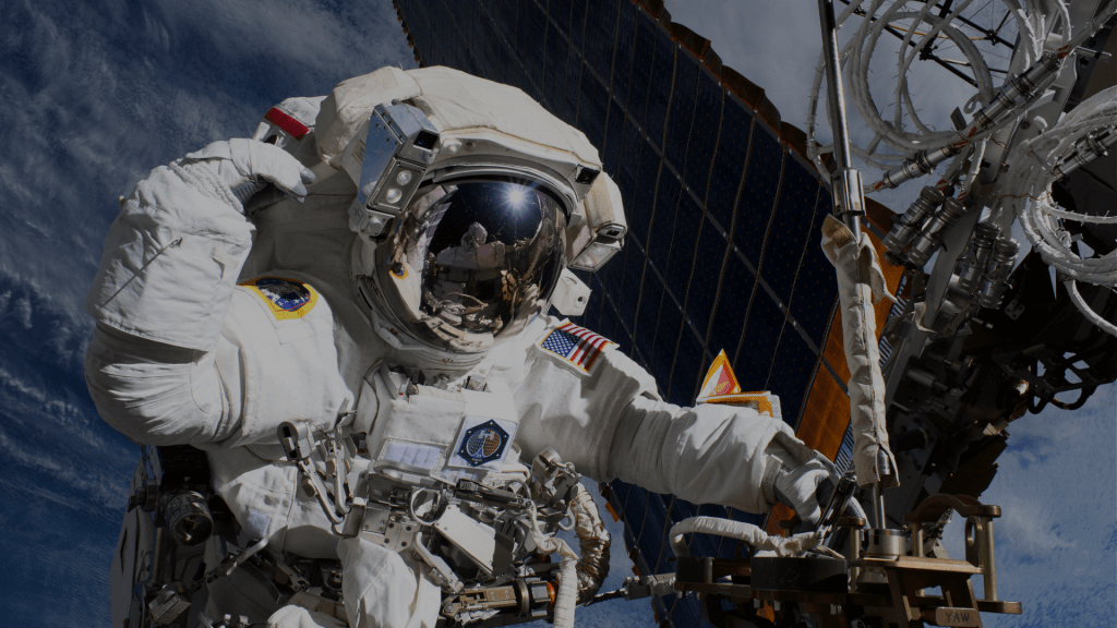 Pictured here, NASA astronaut Anne McClain conducts a spacewalk near one of the solar arrays to upgrade power systems and relocate a communications antenna.