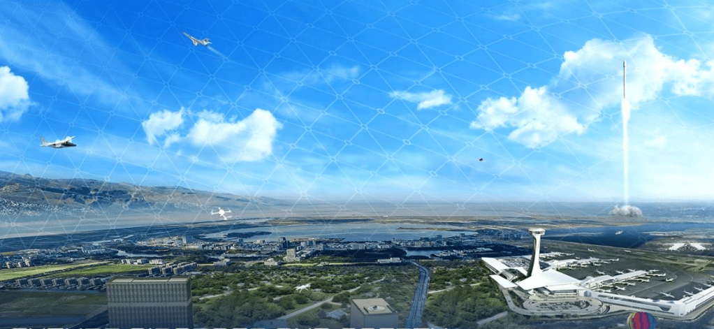 Artist concept showing multiple airplanes and a rocket sharing the airspace with a large airport seen on the ground below.