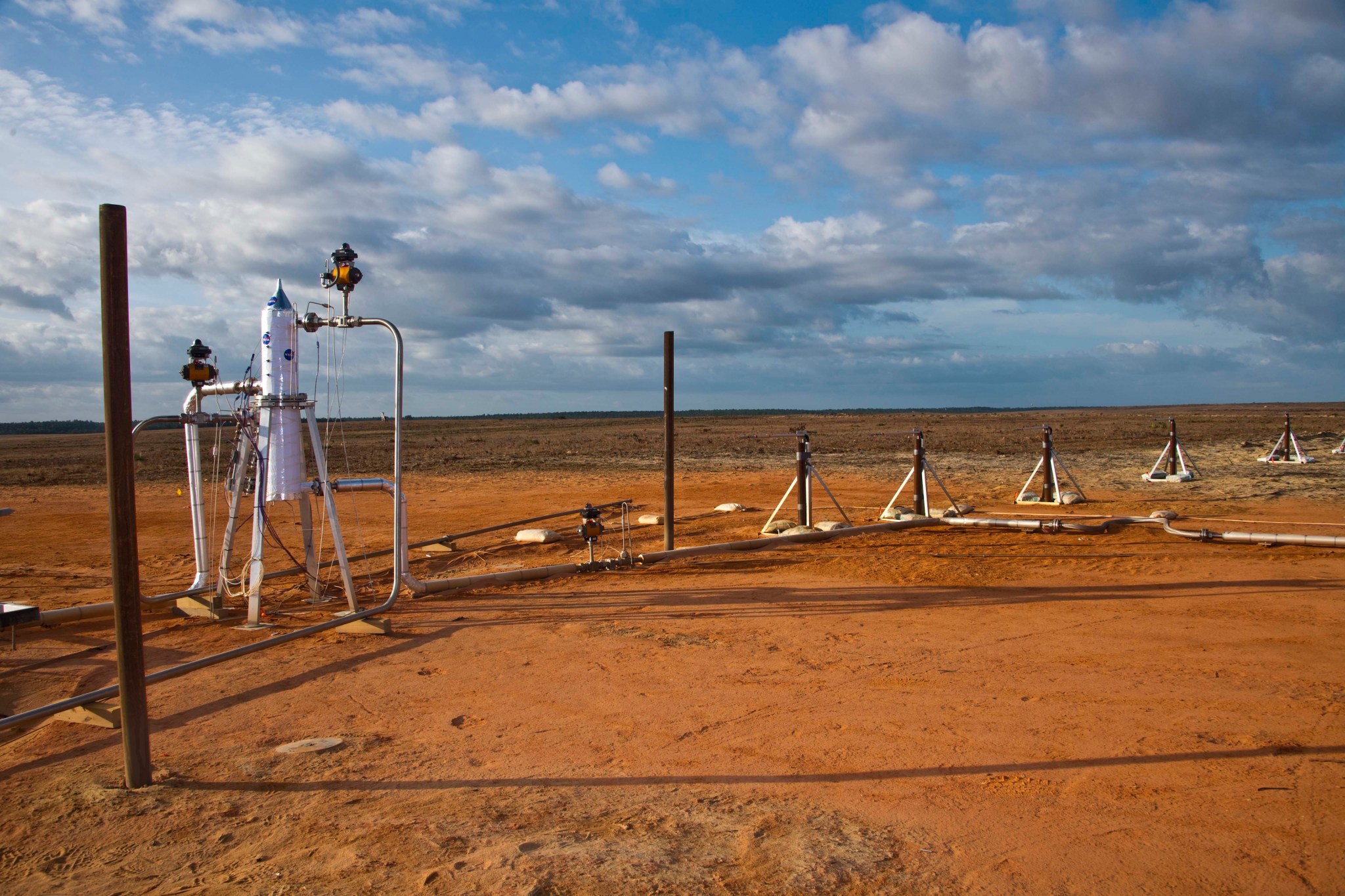 A test article is equipped with cryogenic piping and valving, prepped to provide engineers with explosion data