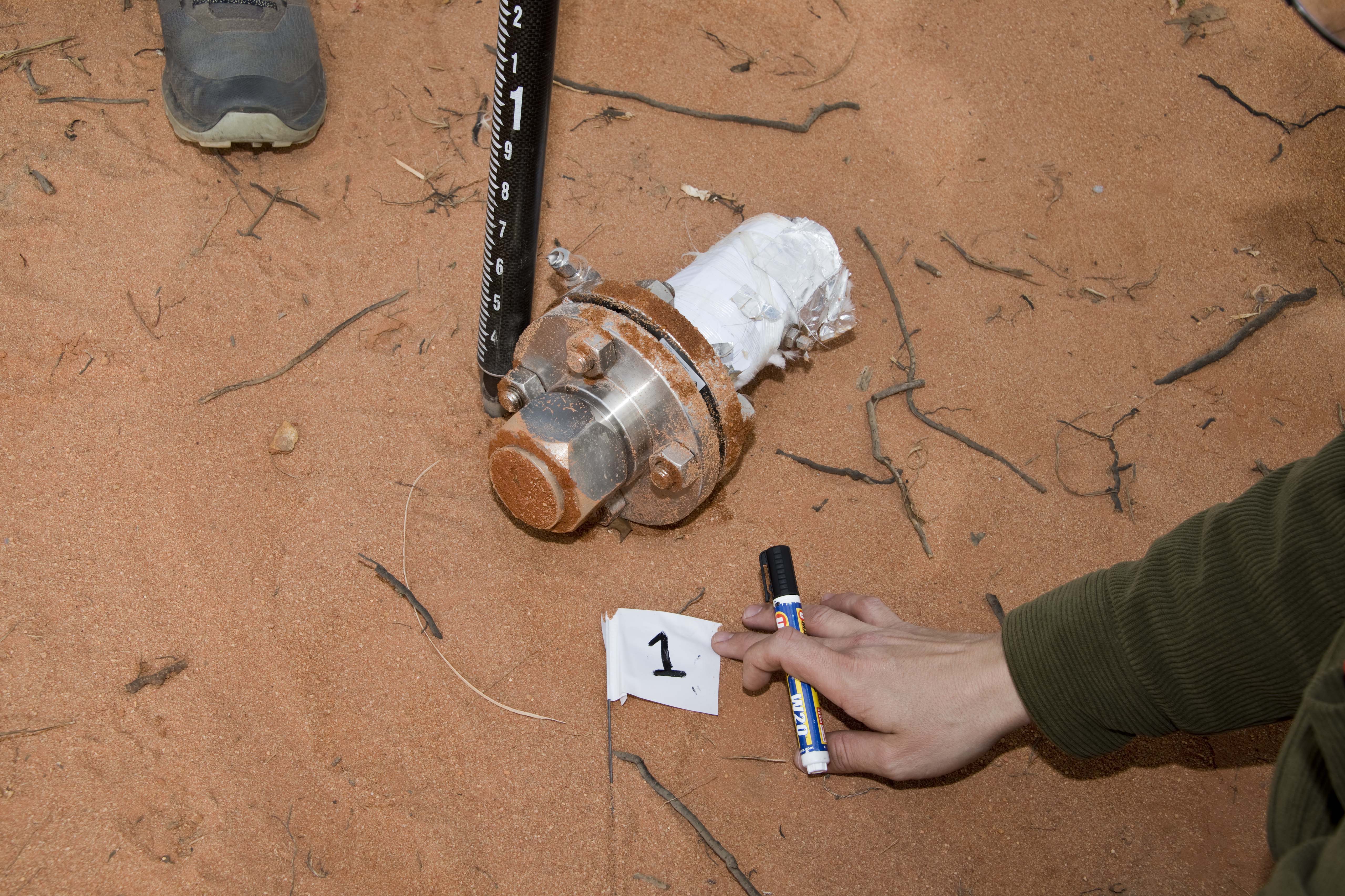 Personnel record GPS coordinates of a recovered fragment.