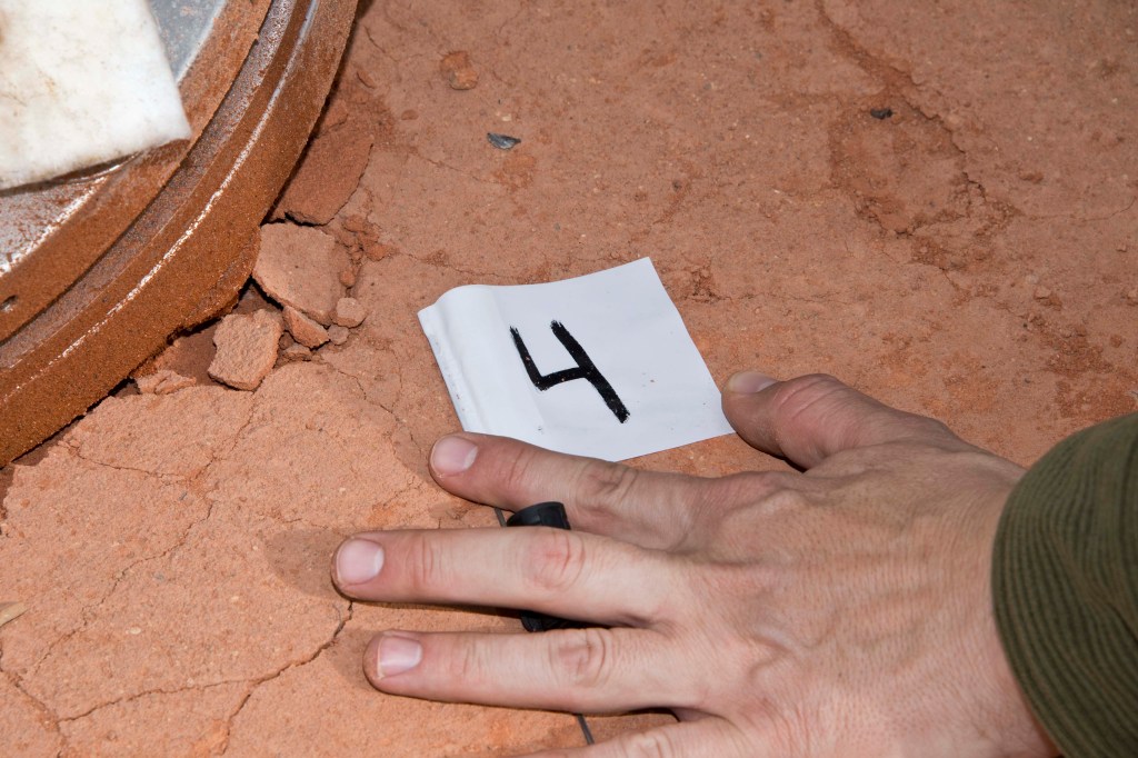 Personnel record upper tank impact point using GPS.