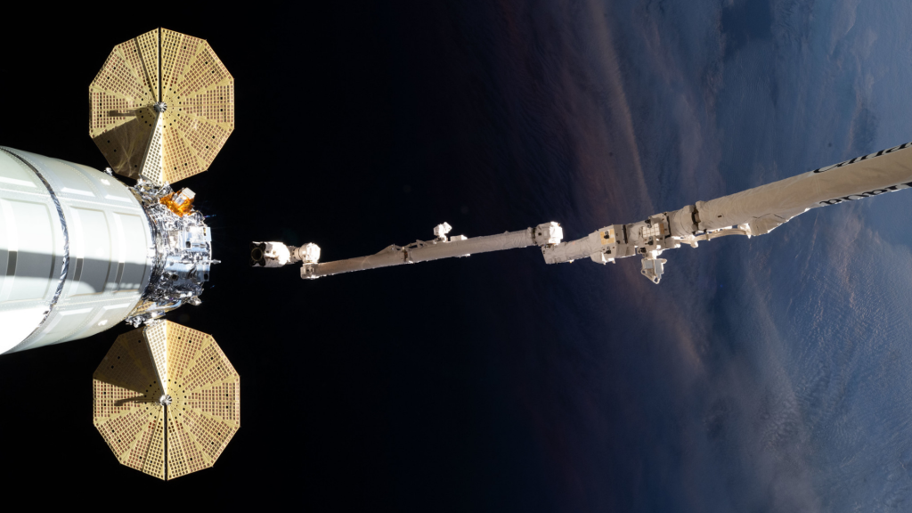 The Canadarm2 robotic arm releases Northrop Grumman’s Cygnus XL cargo craft after it was installed on the Earth-facing port of the Unity module.