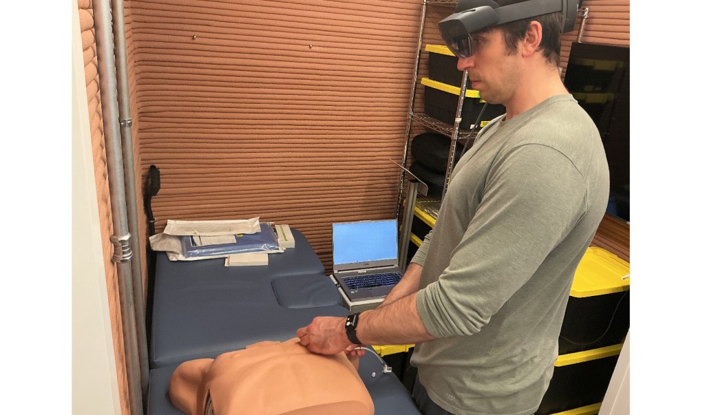 Ross Elder, Crew Health and Performance Exploration Analog (CHAPEA) Mission 2 commander, conducts a demonstration of an artificial intelligence-enabled medical system.