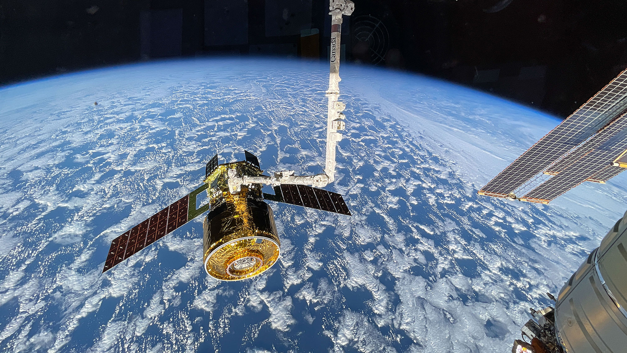 The new HTV-X1 cargo spacecraft from JAXA (Japan Aerospace Exploration Agency) is pictured in the grips of the Canadarm2 robotic arm after completing its arrival at the International Space Station. The spacecraft launched four days earlier from the Tanegashima Space Center in Japan carrying approximately 12,800 pounds of science, supplies, and hardware for the Expedition 73 crew.