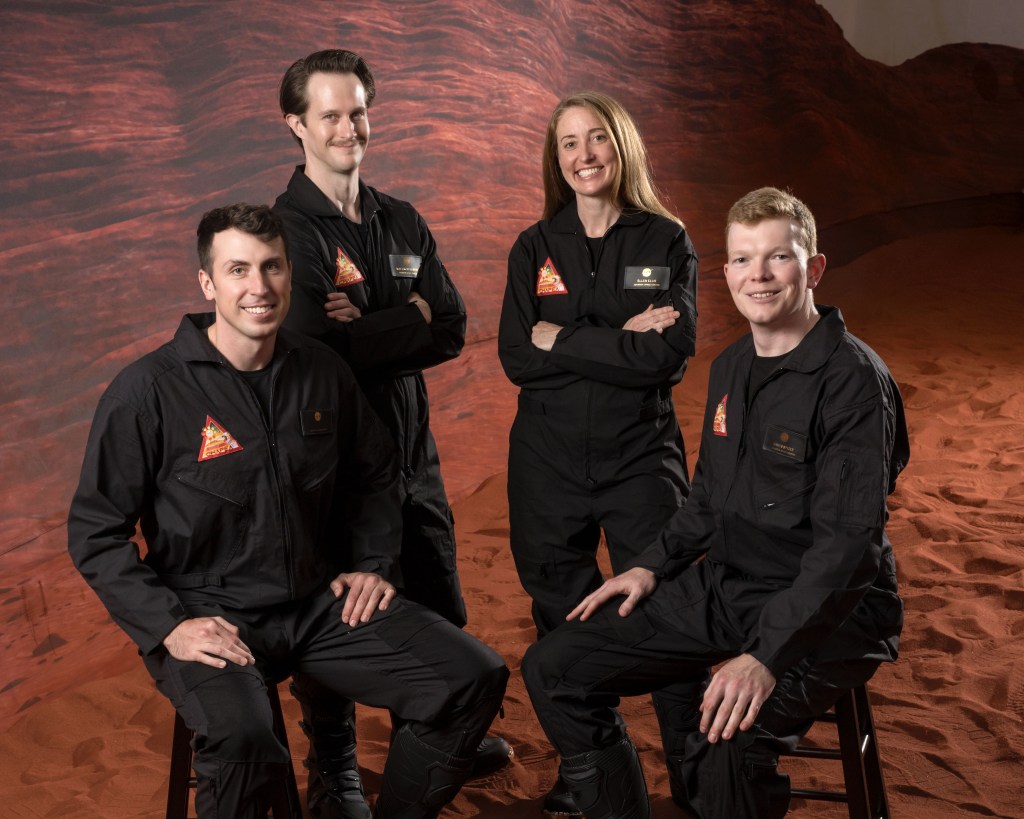 Official Crew Portrait of Crew Health and Performance Exploration Analog (CHAPEA) Mission 2 Crew for NASA's one-year analog mission in a habitat to simulate living on Mars. Photo credit: NASA/Helen Arase Vargas and Bill Stafford
