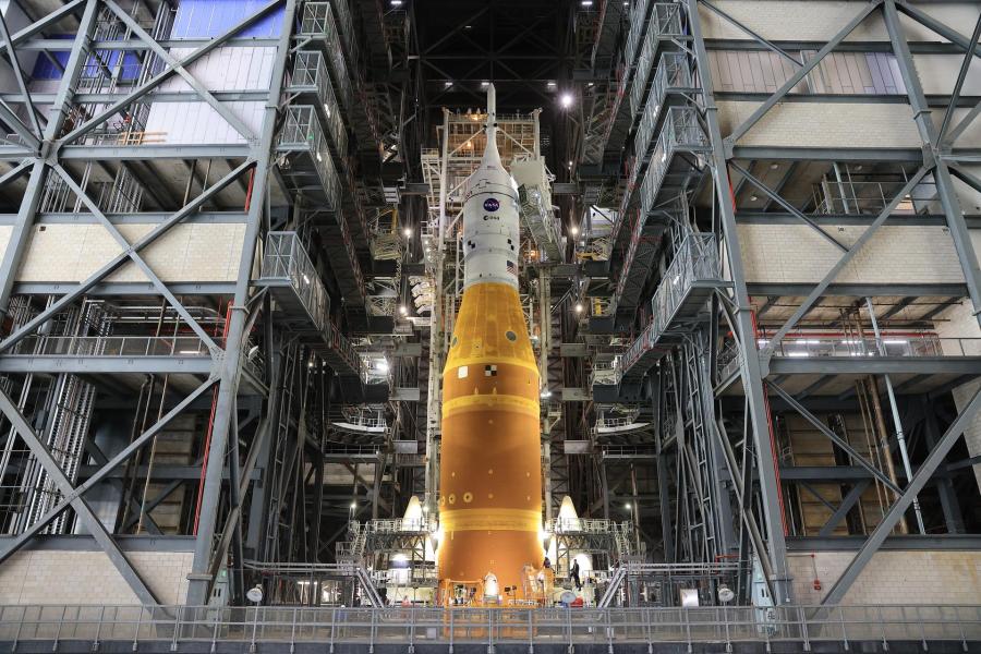 NASA’s Artemis II SLS (Space Launch System) rocket and Orion spacecraft, secured to the mobile launcher, stands vertical inside the Vehicle Assembly building on Tuesday, March 17, 2026, as preparations continue for rollout to Launch Complex 39B at NASA’s Kennedy Space Center in Florida. The Artemis II test flight will take Commander Reid Wiseman, Pilot Victor Glover, and Mission Specialist Christina Koch from NASA, and Mission Specialist Jeremy Hansen from the CSA (Canadian Space Agency), around the Moon and back to Earth with launch opportunities beginning in April 2026.