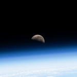 The Last Quarter Moon is pictured above Earth's atmosphere from the International Space Station as it soared 260 miles over the Pacific Ocean southwest of Panama on the Latin American continent.