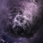 Lightening is shown flashing through wispy storm clouds off the coast of North Carolina while the crew was orbiting 260 miles (418 kilometers) above the Atlantic Ocean. The hue of the clouds is a mix of lighter and darker purples. The clouds appear to be funneling in towards a brighter mass of clouds in the center.