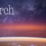 The Milky Way spans the night sky above a bright orange-yellow airglow that blankets the city lights along the east coast of Africa, from Kenya to Somalia.